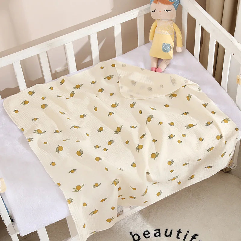 Soft cotton muslin baby swaddle blanket by I YAN with cute cartoon prints, breathable and gentle for newborn boys and girls.