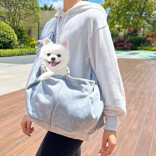 Portable I YAN outdoor pet carrier bag for small dogs and cats, with shoulder strap and mesh sides for comfort and ventilation.