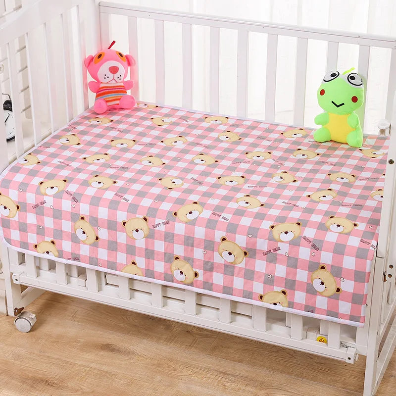 Waterproof baby changing pad cover by I YAN, reusable mattress protector for infants with soft, absorbent fabric.