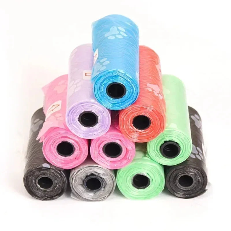 I YAN dog poop bags refill roll with outdoor pet waste cleanup bags for walking and travel, showing compact rolls of biodegradable bags.
