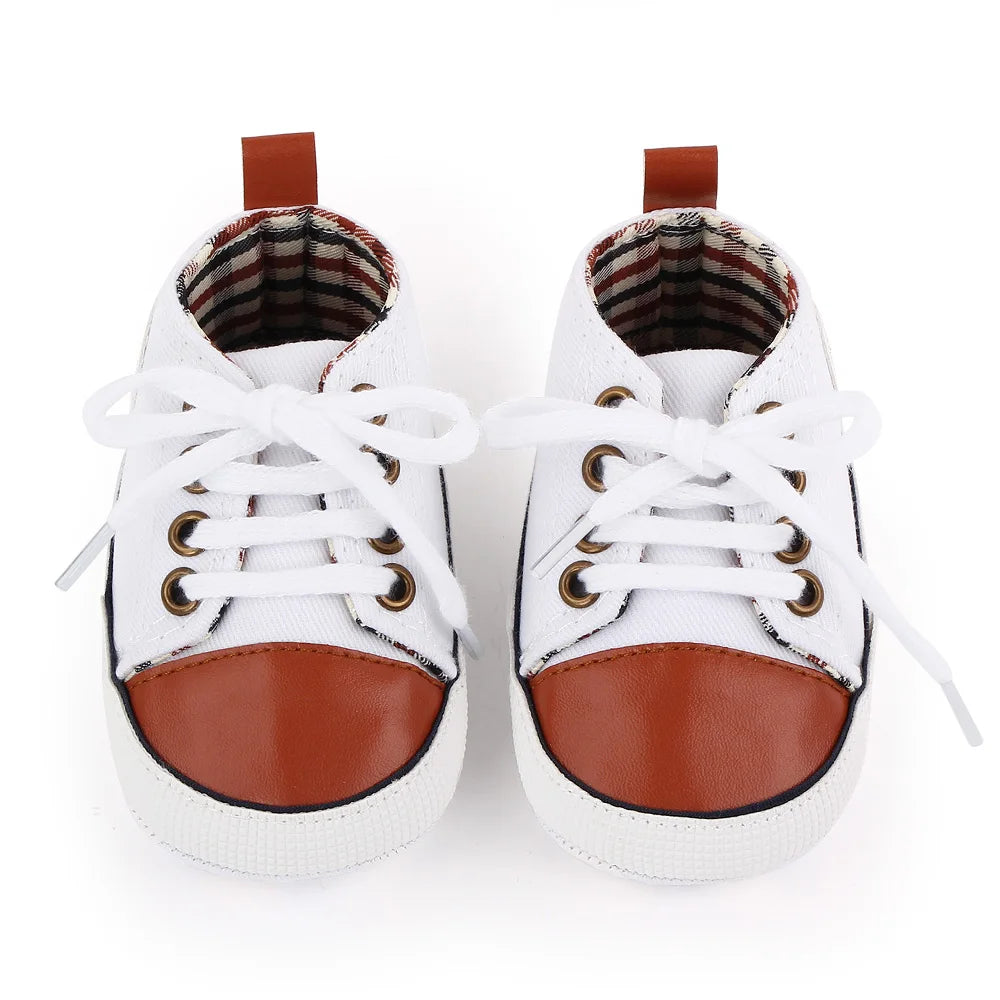 I YAN baby canvas sneakers for boys and girls, soft sole, non-slip toddler shoes perfect for first walkers and casual wear.