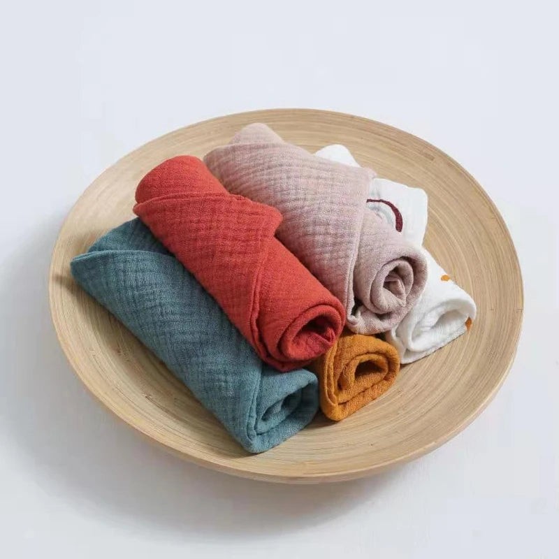 Set of five square cotton baby face towels and burp cloths from I YAN, soft, absorbent, ideal for feeding and cleaning babies.