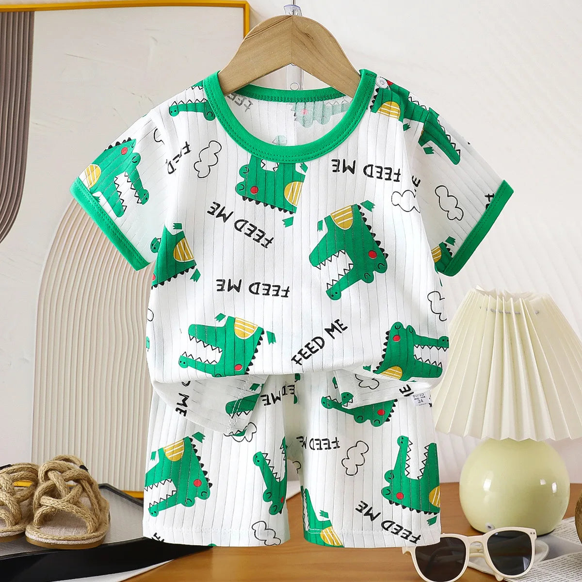 Two-piece children's clothing set by I YAN featuring a cotton summer T-shirt and shorts for boys and girls.