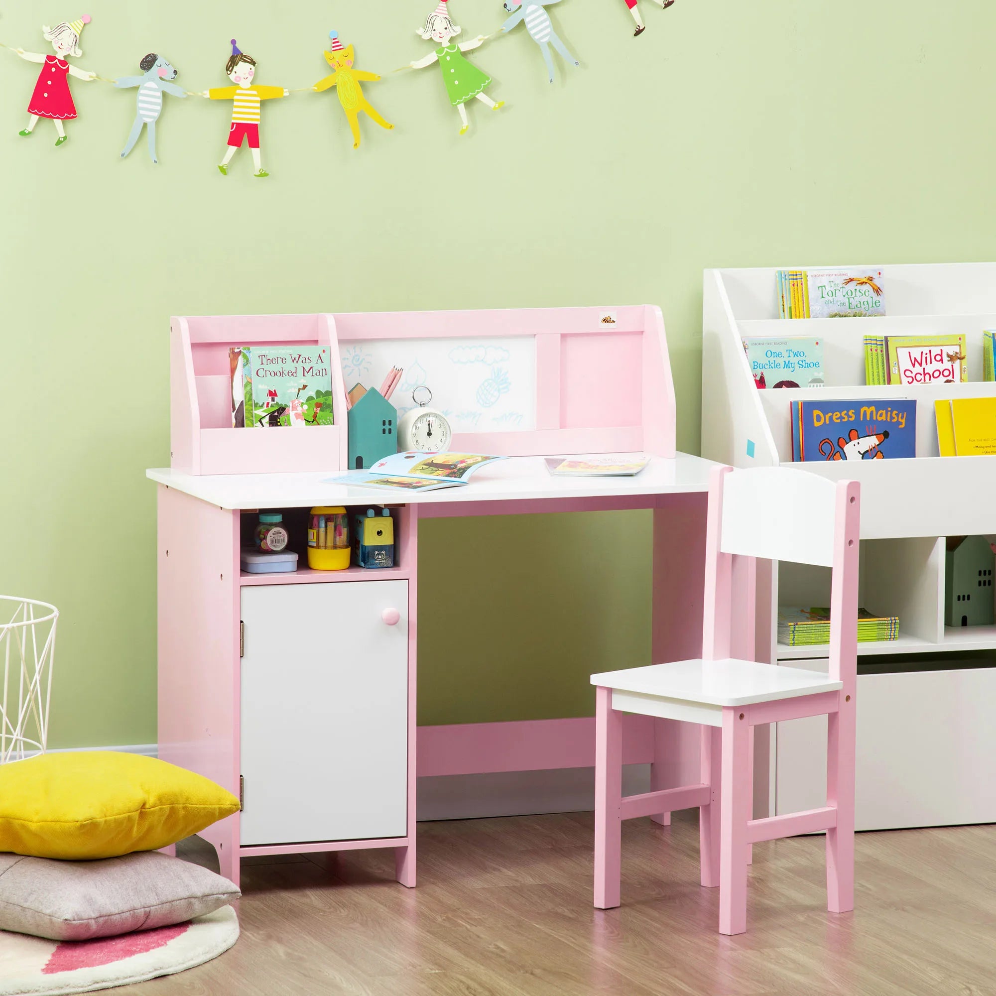 Pink toddler table and chair set by I YAN featuring a kids writing desk with whiteboard and storage cabinet.