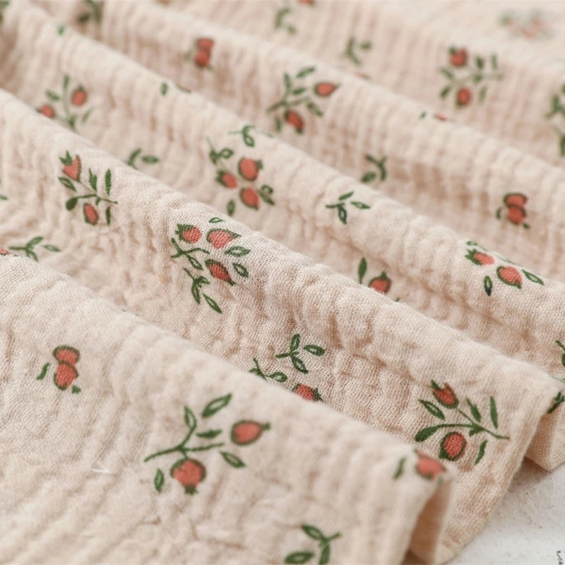 I YAN cotton baby swaddle blanket with floral print, soft muslin fabric, ideal for newborns and stroller covers.