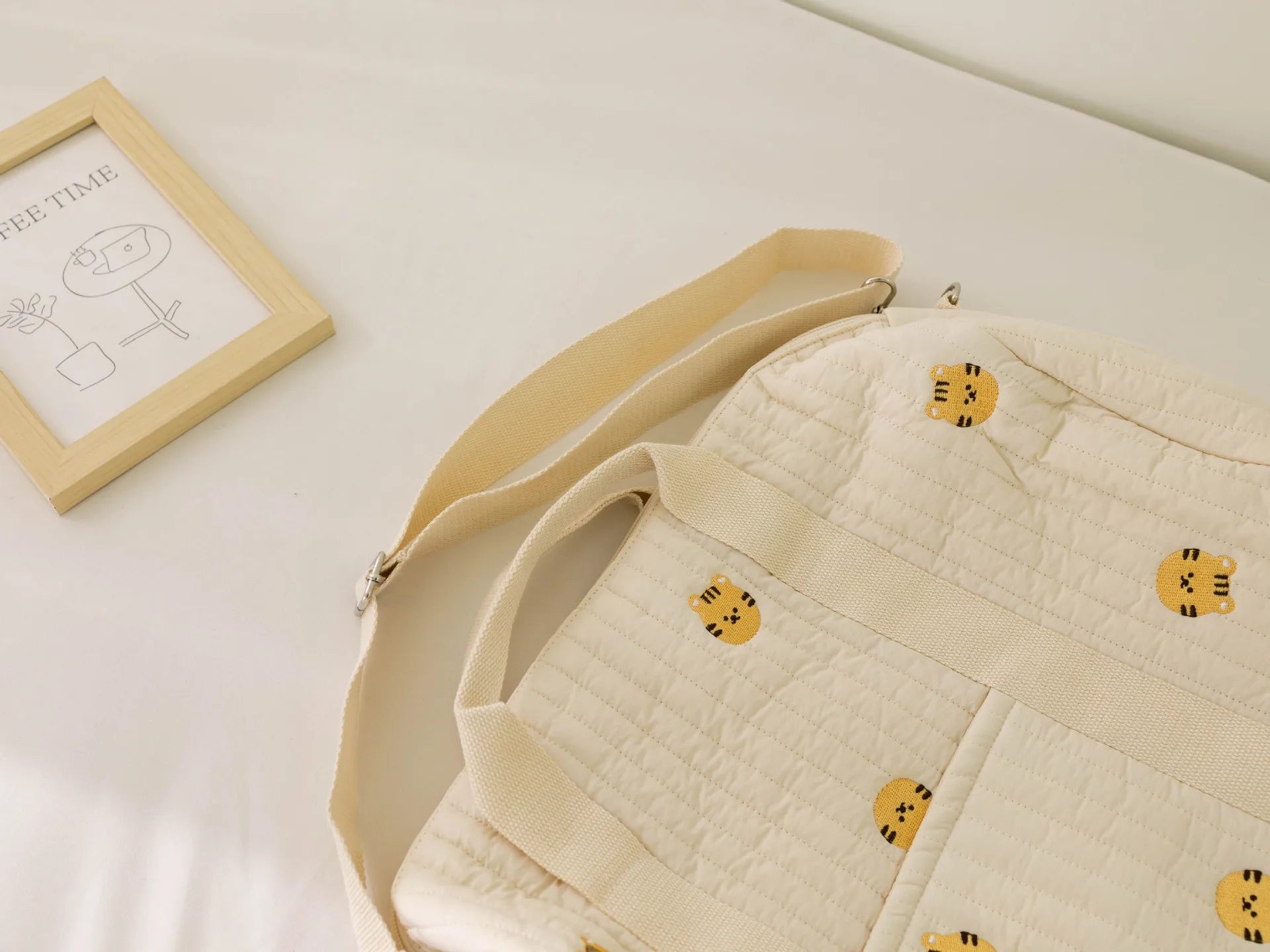 I YAN Mommy Bear Maternity Diaper Bag with stroller straps, changing pad, and multiple compartments for baby essentials.