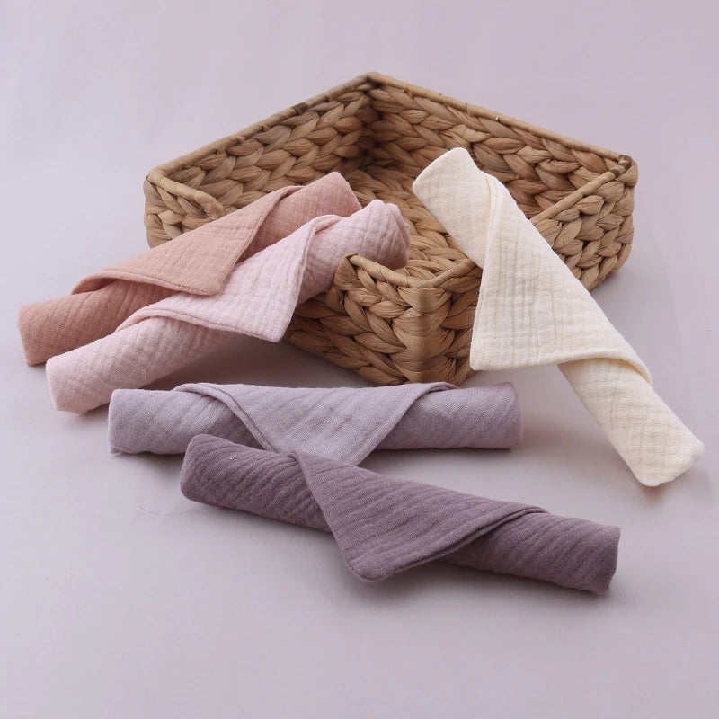 Set of five I YAN cotton baby face towels and burp cloths with soft, absorbent gauze fabric for kids' feeding and cleaning needs.
