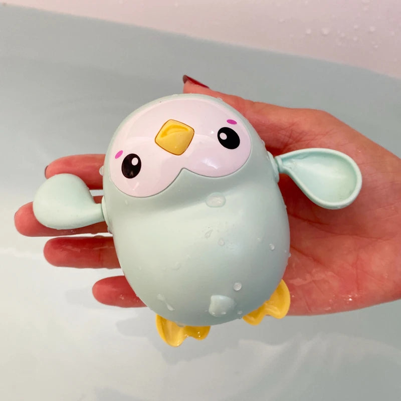 I YAN baby bath toy set with cute duck and penguin water spray sprinklers for kids, perfect for bath time fun.