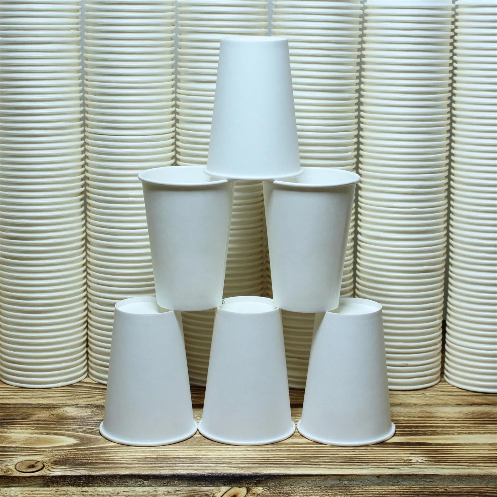 Set of 50, 500, or 1000 I YAN disposable 210ml solid color paper coffee cups for hot drinks and party use.
