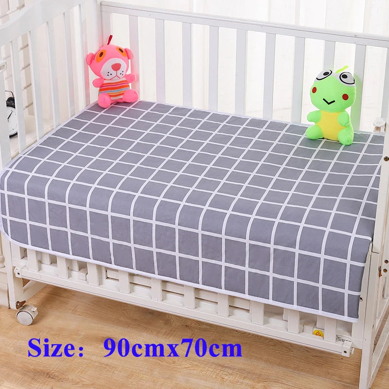 I YAN waterproof changing pad cover for babies, reusable bed pad and diaper mat with soft fabric and waterproof backing.