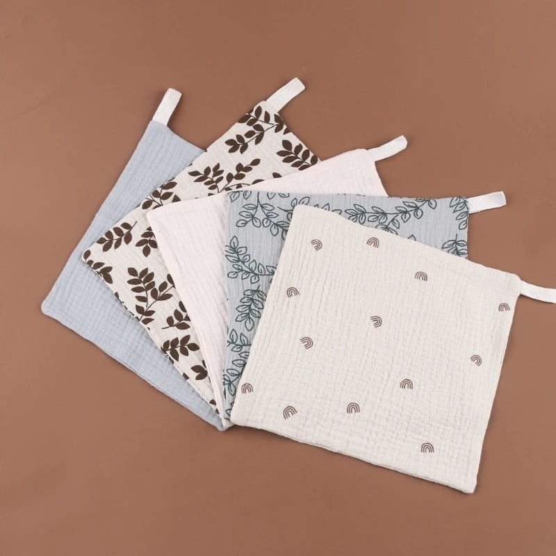 Set of five soft, absorbent cotton baby face towels and burp cloths from I YAN, featuring square design and gentle gauze fabric.