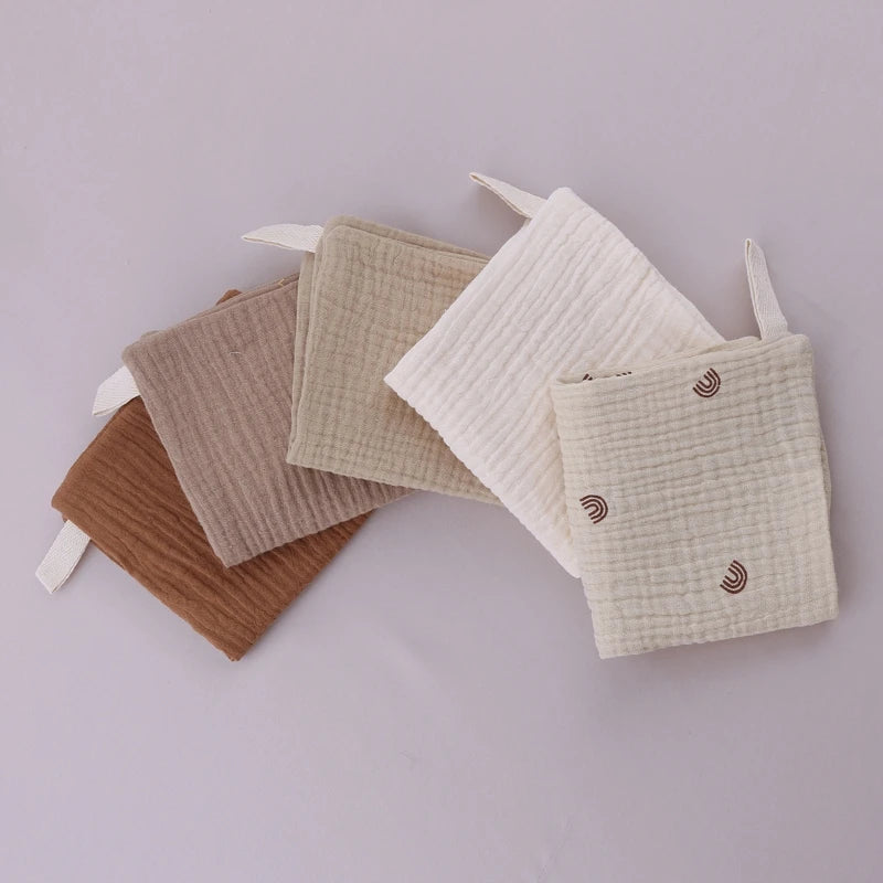 Set of five I YAN square cotton baby face towels and burp cloths with soft, absorbent gauze for feeding and cleaning.
