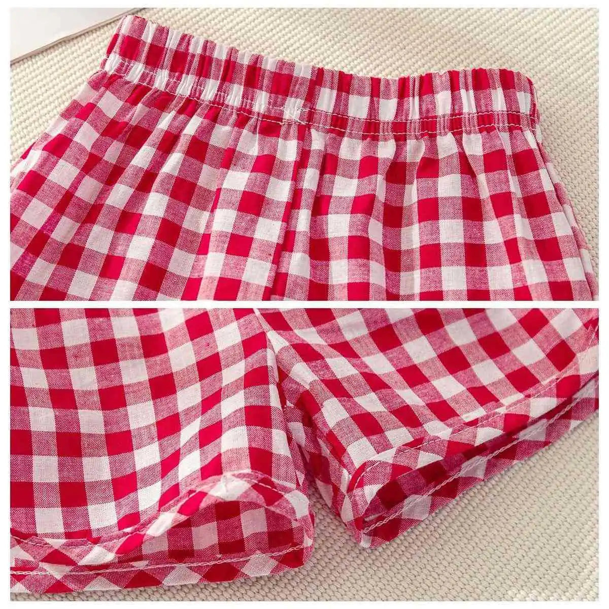 Children's summer 2-piece set by I YAN with a short-sleeved round neck top and plaid shorts featuring lemon and grape cartoon prints.
