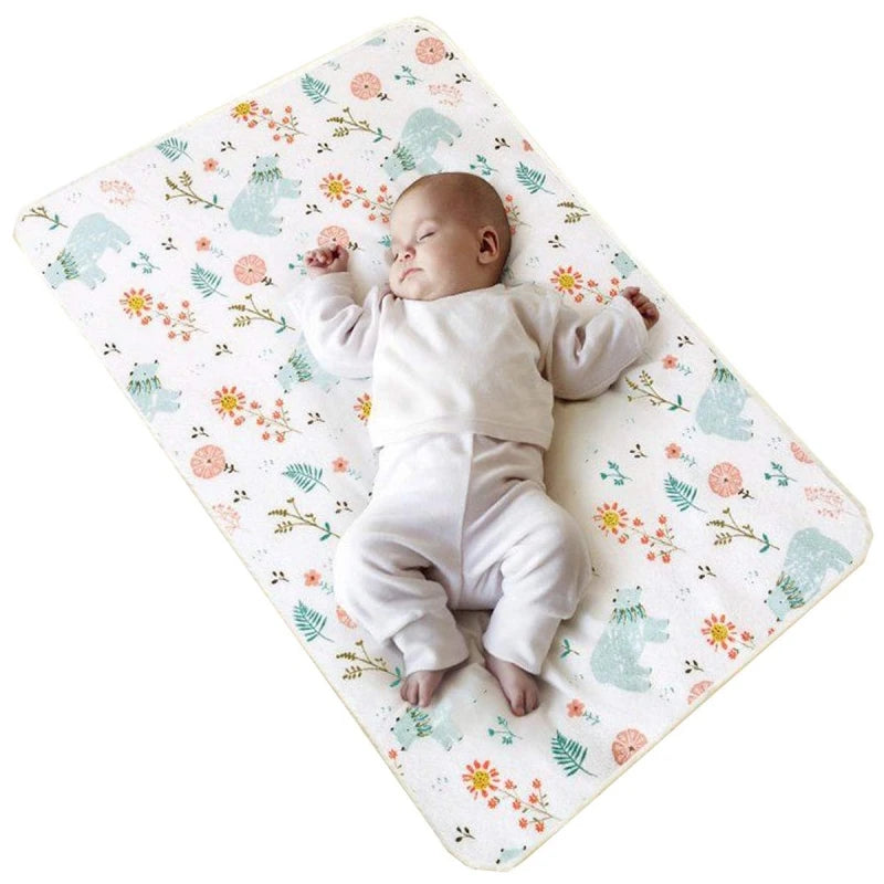 Waterproof baby changing pad cover from I YAN with soft fabric, reusable design, suitable for diaper pads and travel mattress protection.