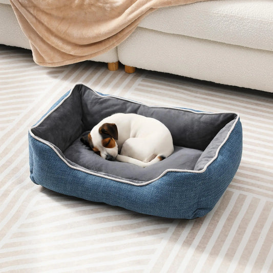 Blue small dog and cat bed with plush fabric, anti-slip bottom, removable washable cover, ideal for indoor and outdoor use.