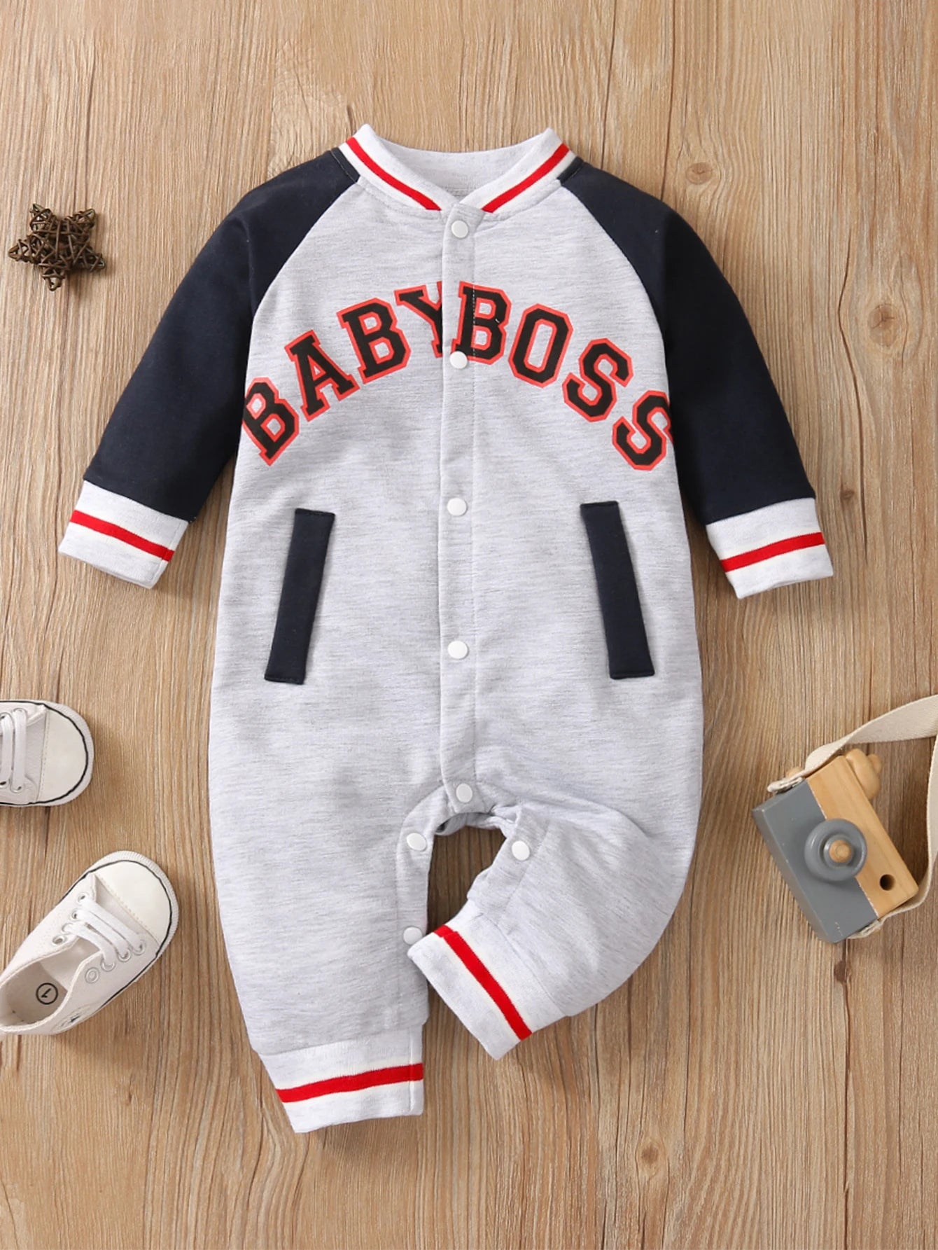 Fashionable letter printed black long sleeved round neck baby boy jumpsuit
