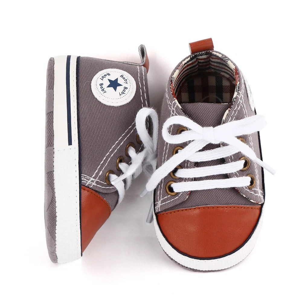 I YAN baby shoes for boys and girls, classic canvas sneakers with soft soles and non-slip design for first walkers and toddlers.
