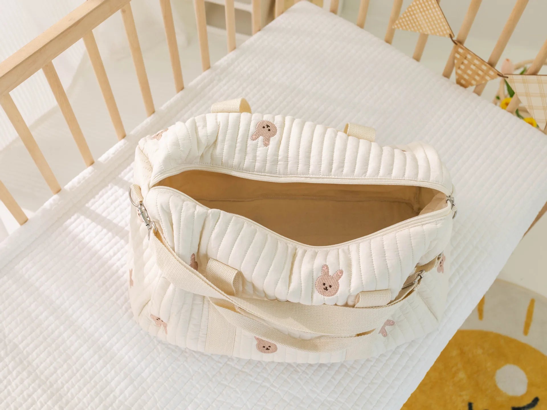 I YAN Mommy Bag Bear maternity diaper bag with stroller straps and multiple compartments, ideal for travel and baby care.