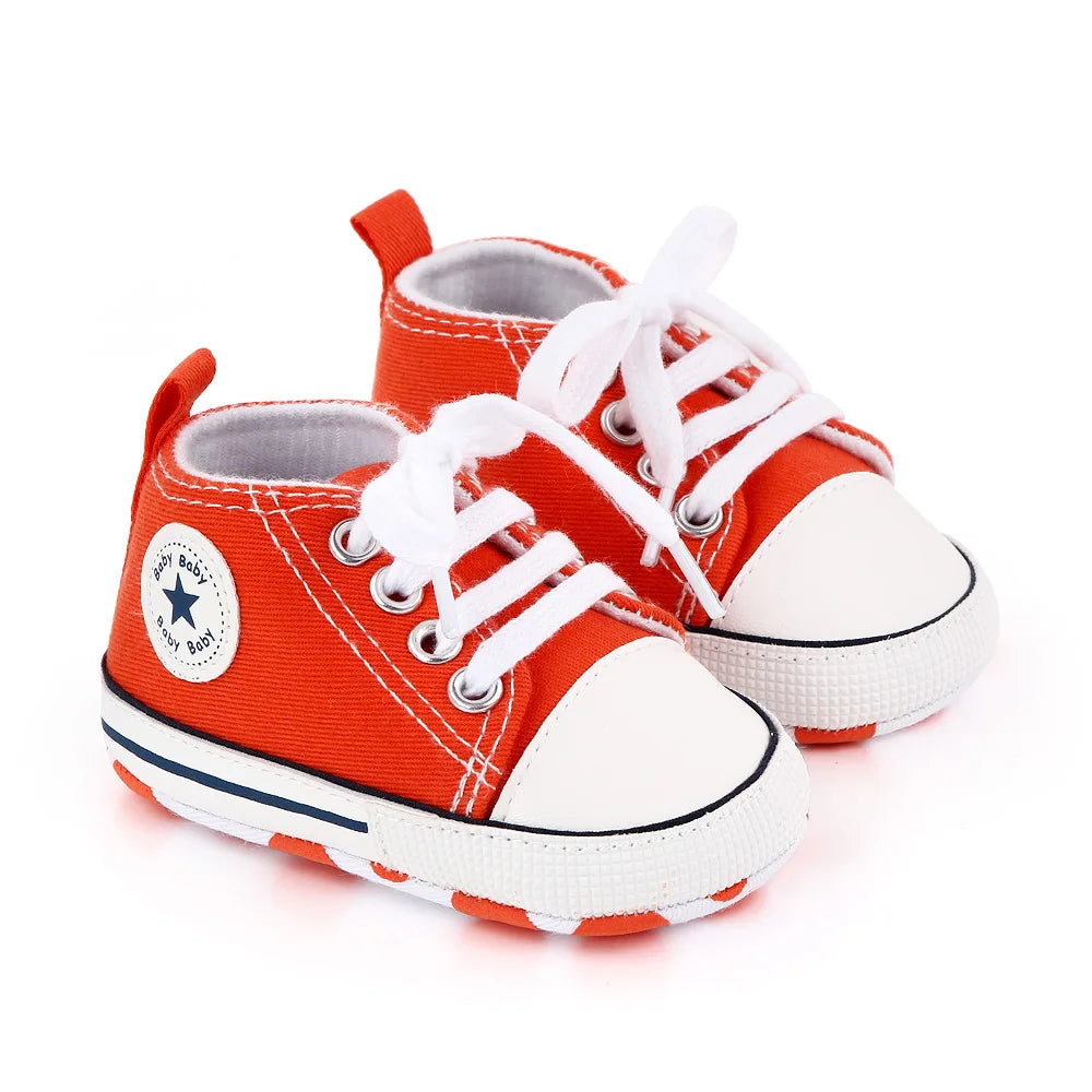 I YAN baby canvas sneakers for boys and girls with soft soles, non-slip design, ideal for newborns and toddlers learning to walk.