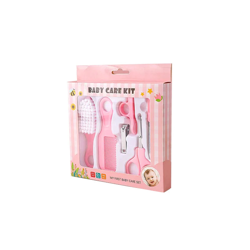 Pink and blue 5-in-1 baby grooming kit by I YAN with brush, comb, nail scissors, and nail file for newborn care.