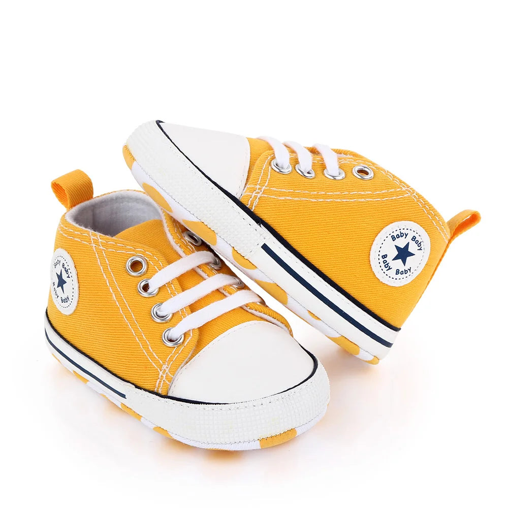 I YAN baby canvas sneakers for boys and girls with soft soles, non-slip design, perfect for toddlers' first steps and casual walking.