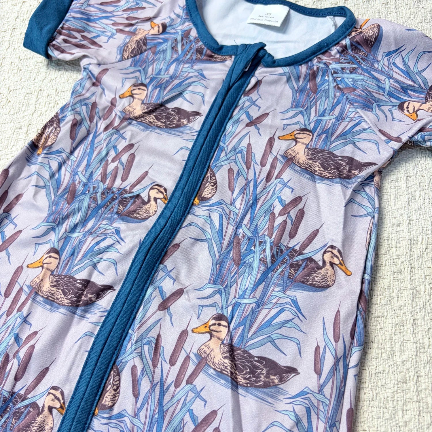 Baby boy summer romper by I YAN with short sleeves, duck design, and zipper closure, perfect for casual toddler wear.
