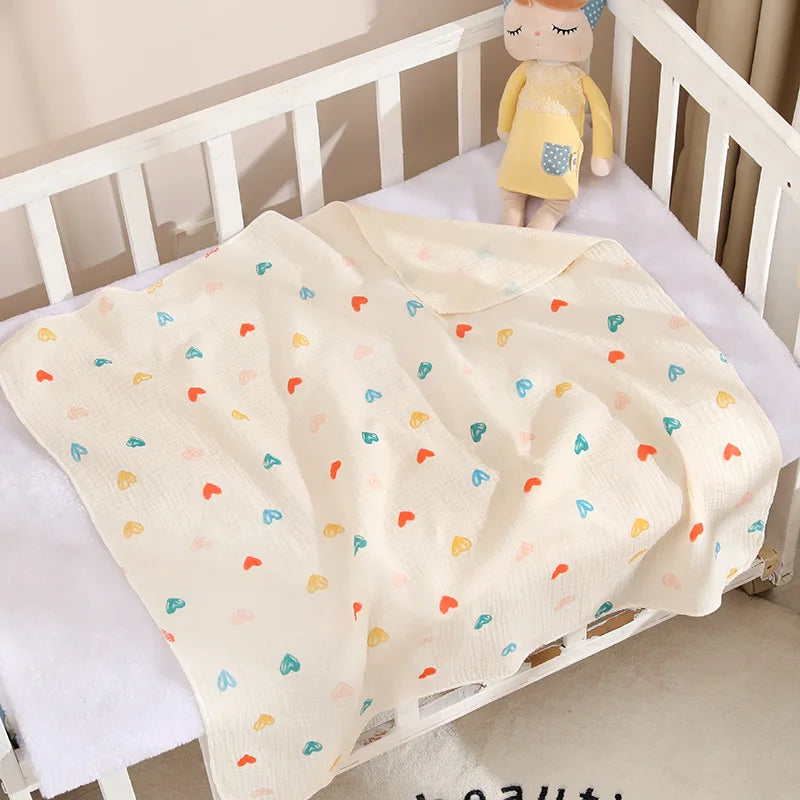Soft cotton muslin baby swaddle blanket with cute cartoon print, breathable and gentle for newborn boys and girls by I YAN.