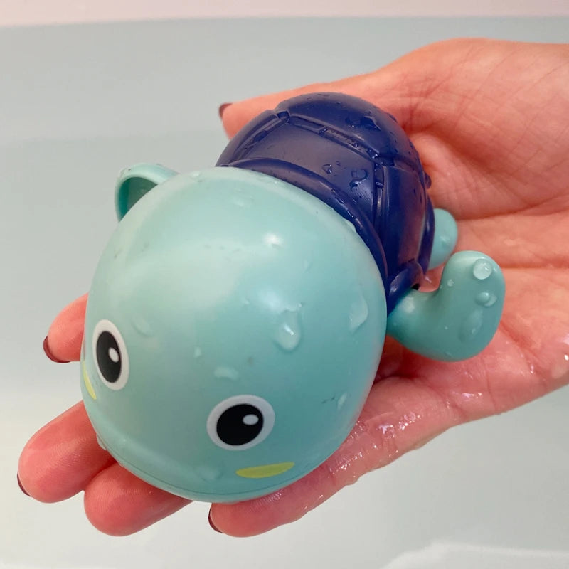 Cute duck and penguin baby bath toy from I YAN, water spray sprinkler for kids, designed for fun bath time play.