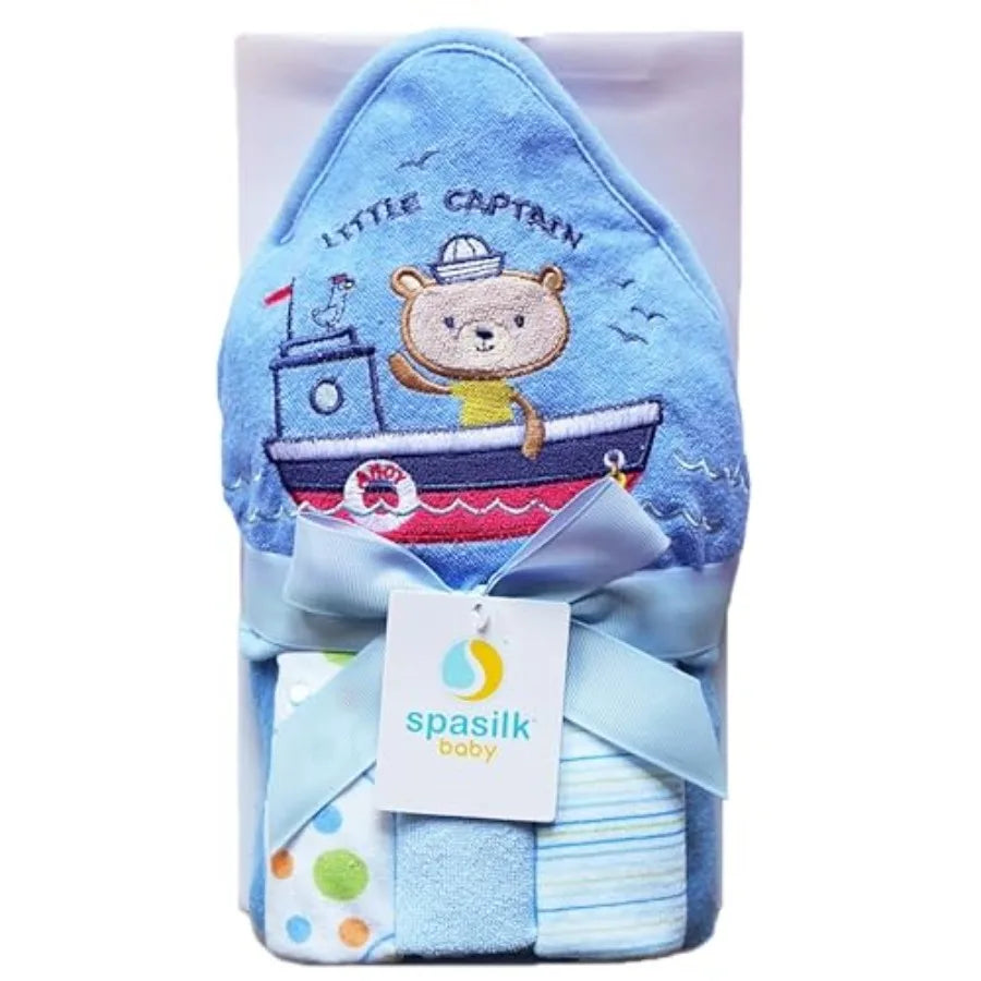 Blue hooded bath towel and three soft terry washcloths for newborns, part of I YAN baby essentials set