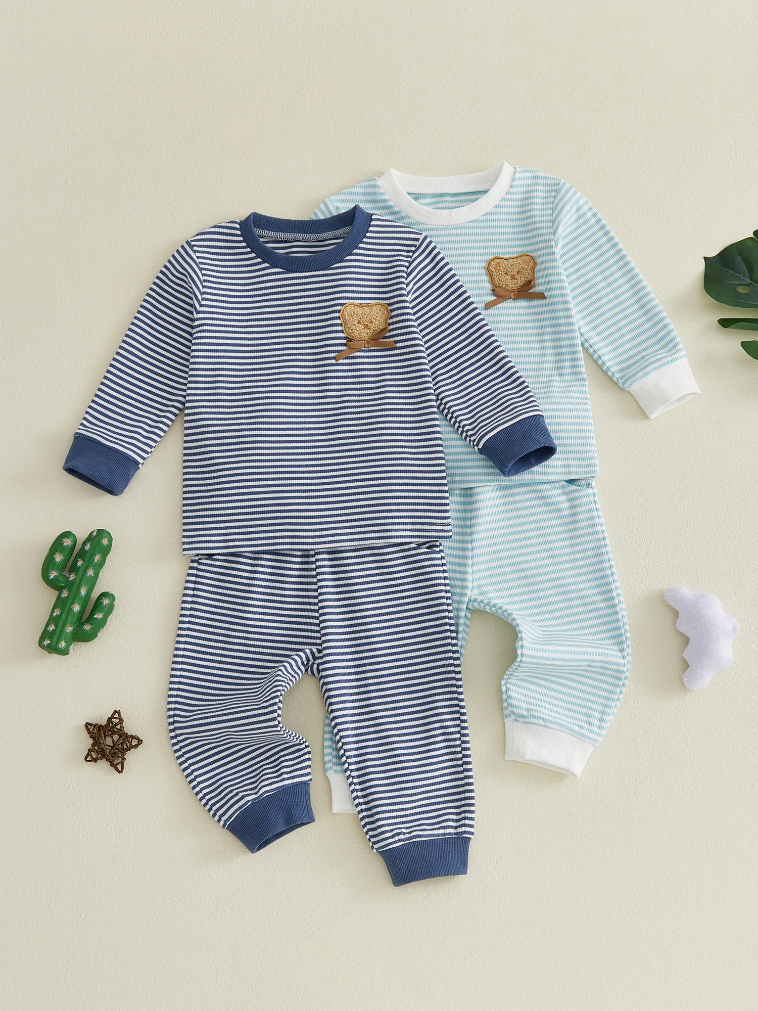 Toddler boy crew neck sweater with striped print, embroidered bear design, from I YAN, featuring a fall-inspired striped neck and matching style.