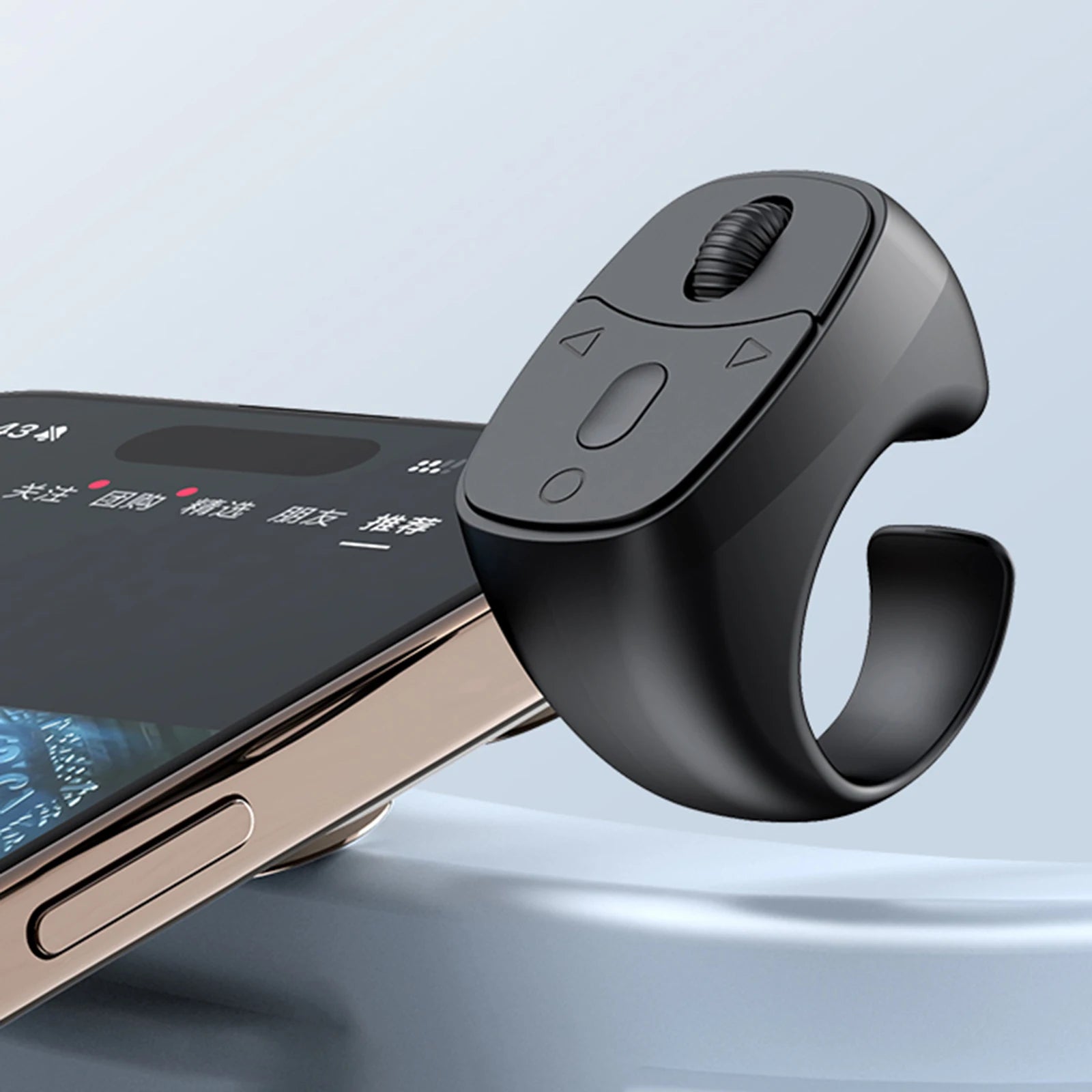 I YAN Bluetooth 5.3 remote control mouse finger ring with wireless camera shutter button on a black background.