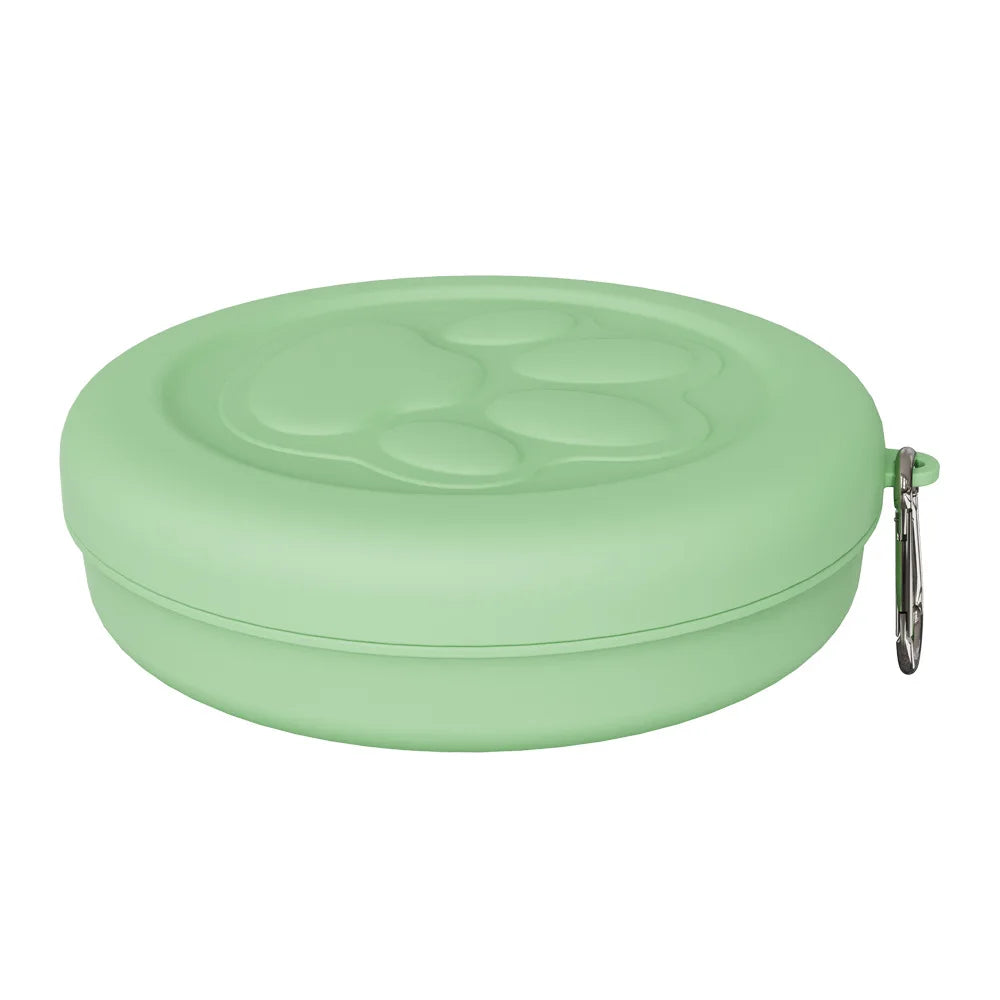 Portable outdoor pet bowl by I YAN, 2-in-1 travel dog food and water dish with treat compartment for hiking and camping.