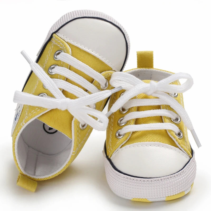 I YAN infant toddler anti-slip canvas sneakers with star design, ideal for first walkers and young children.