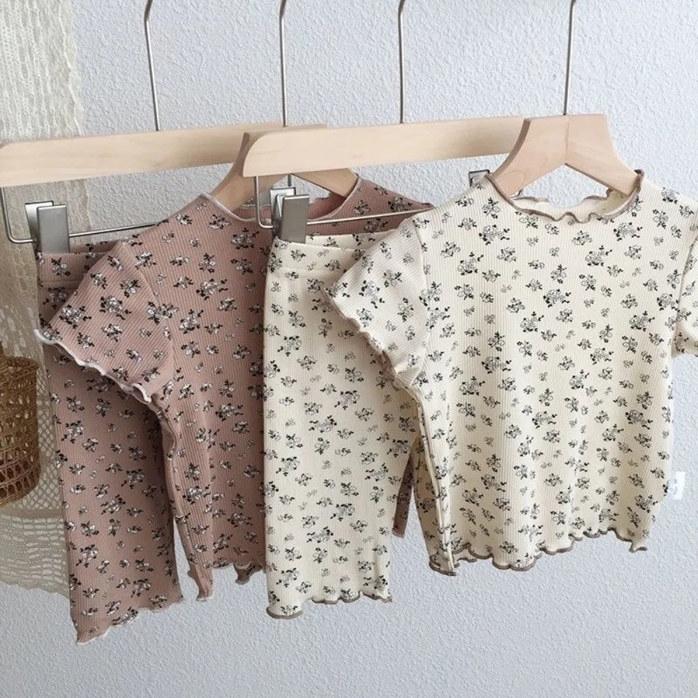 Kids' summer casual T-shirt and pants set by I YAN, featuring a floral printed short sleeve round neck top and matching pants.