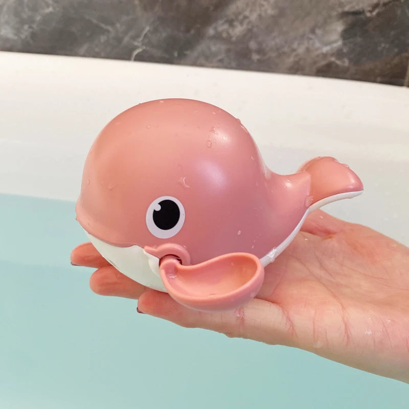 Cute duck and penguin baby bath toy by I YAN with water spray sprinkler for kids, featuring colorful animal designs for bath fun.