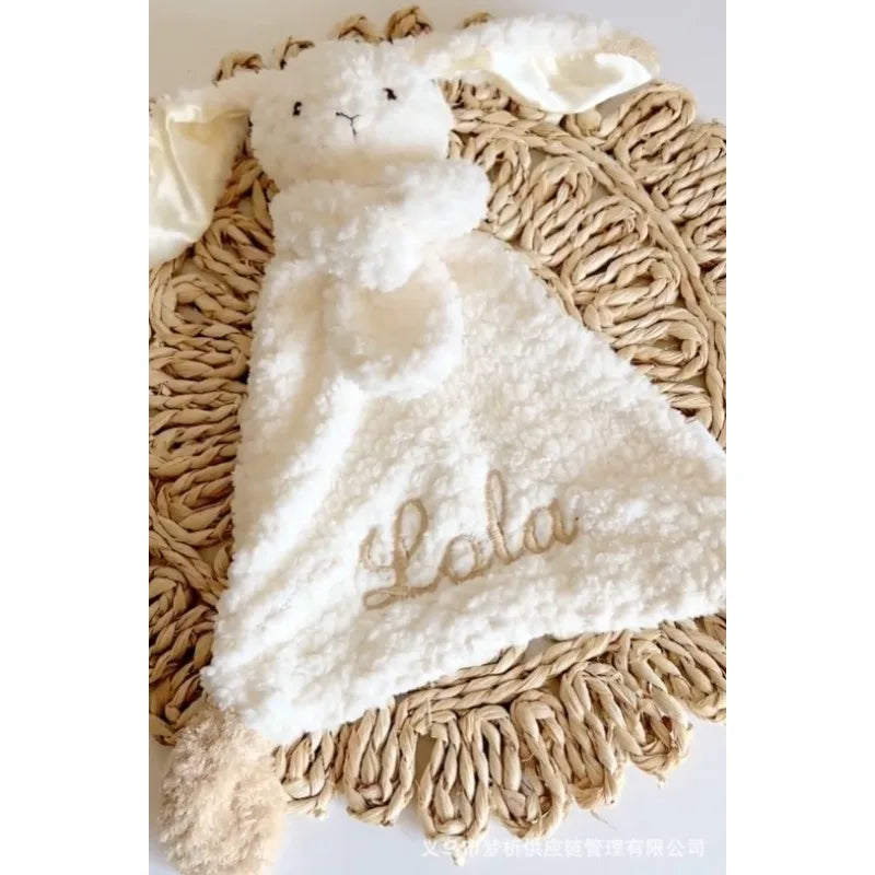 Organic cotton personalized baby burp cloth with cute rabbit embroidery and embroidered name, soothing and soft for baby care.
