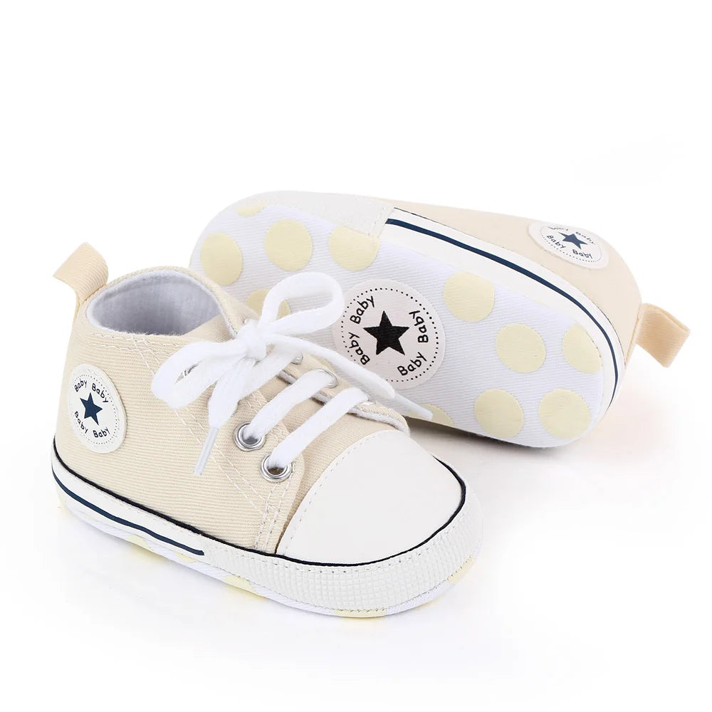 I YAN baby canvas sneakers for boys and girls, soft sole, non-slip toddler shoes for first walkers, casual spring footwear.