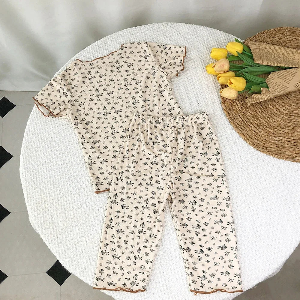 Kids' summer casual T-shirt and pants set by I YAN, featuring floral print, short sleeves, round neck, and comfortable fabric.