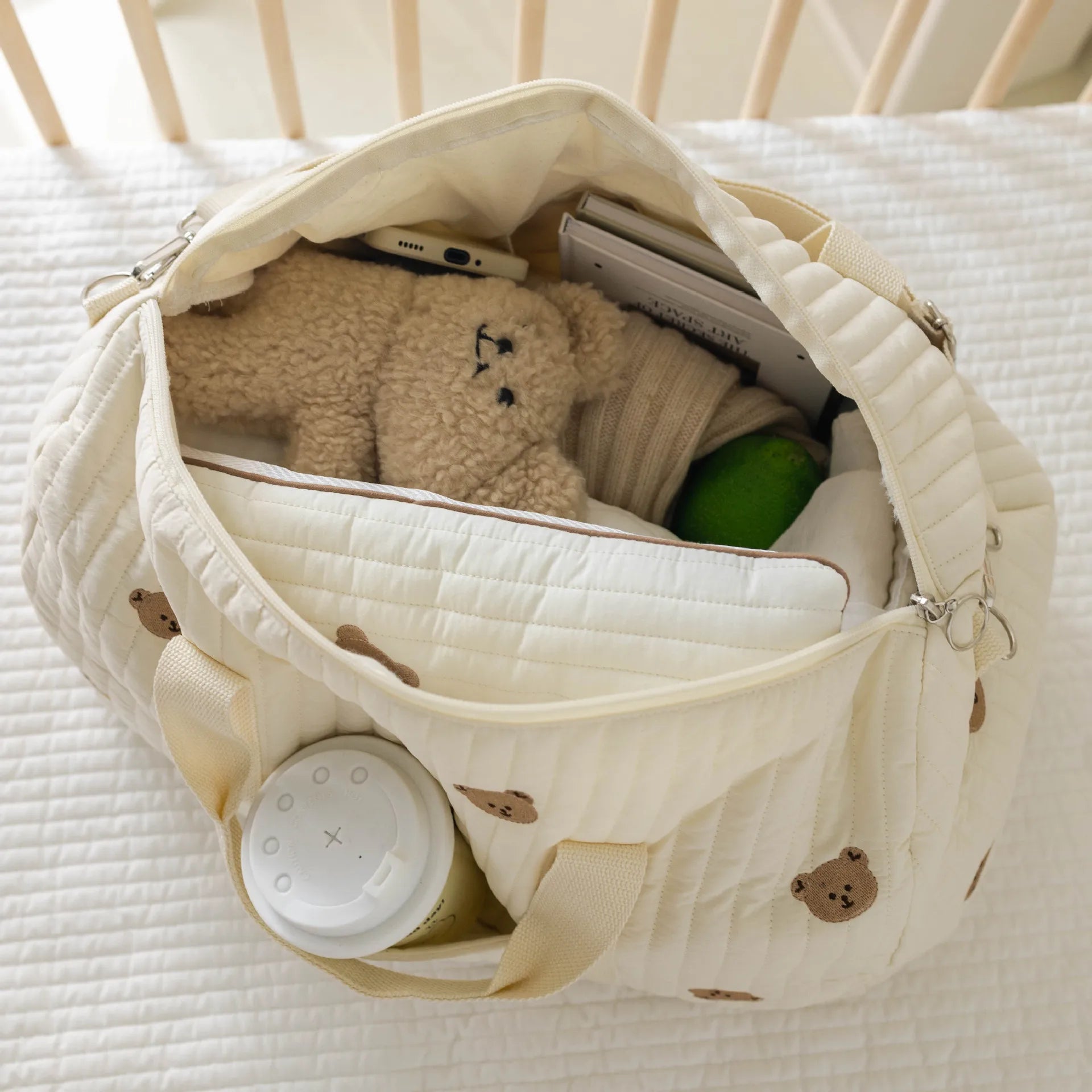 I YAN Mommy Bear Maternity Diaper Bag with multiple compartments, stroller straps, and portable design for baby care on the go.