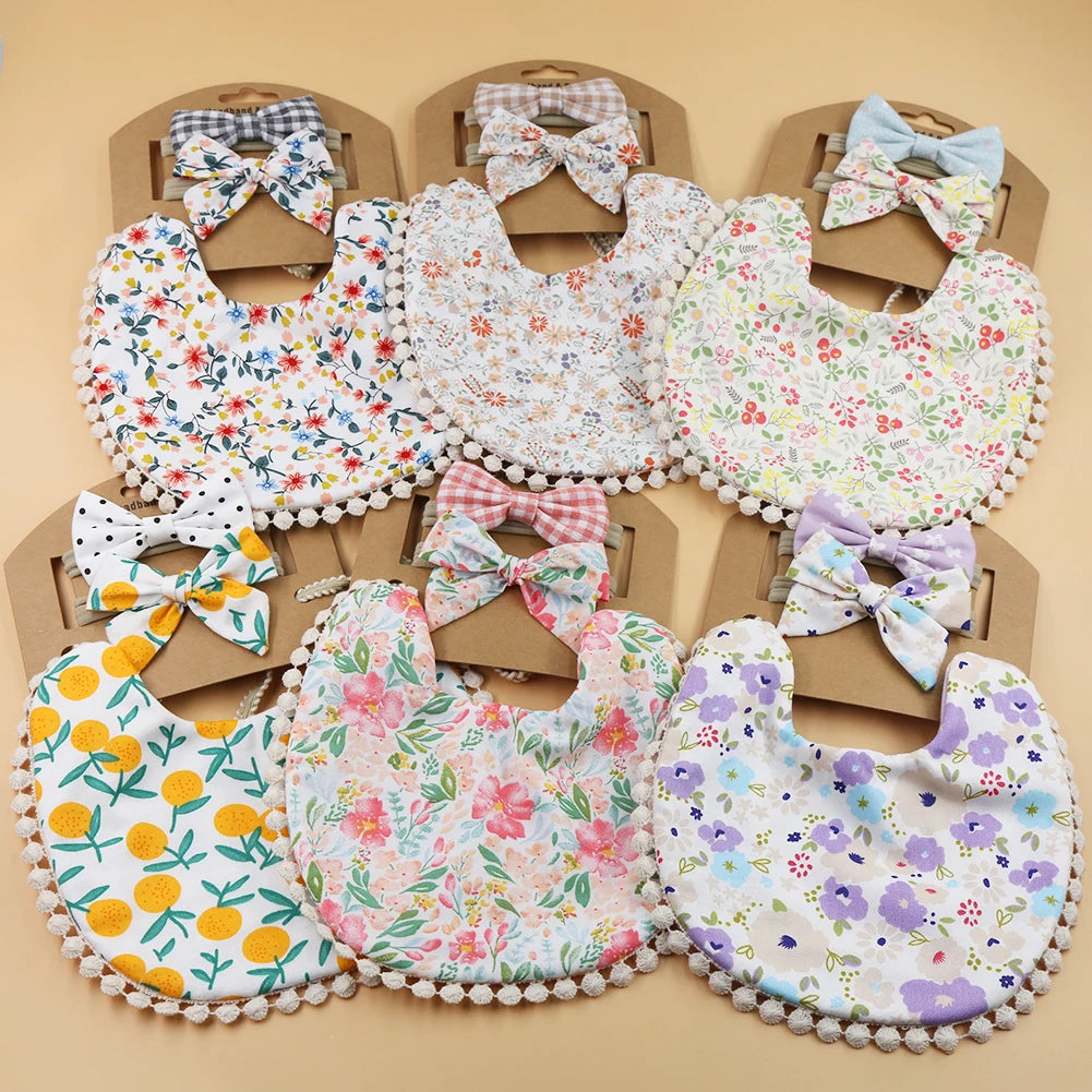 Set of three flower print cotton linen baby bibs, elastic nylon headbands, and double-deck saliva towels from I YAN.