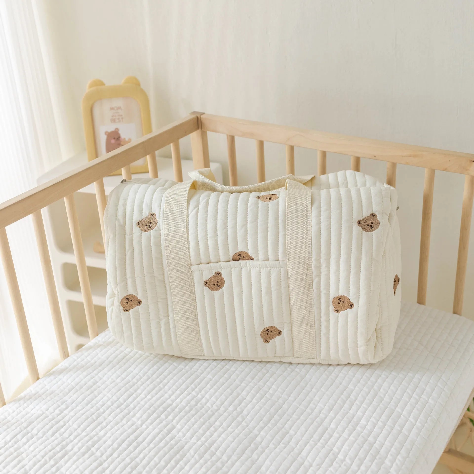 I YAN Mommy Bag Bear maternity diaper bag with stroller straps, baby changing organizer, and spacious tote for travel and daily use.