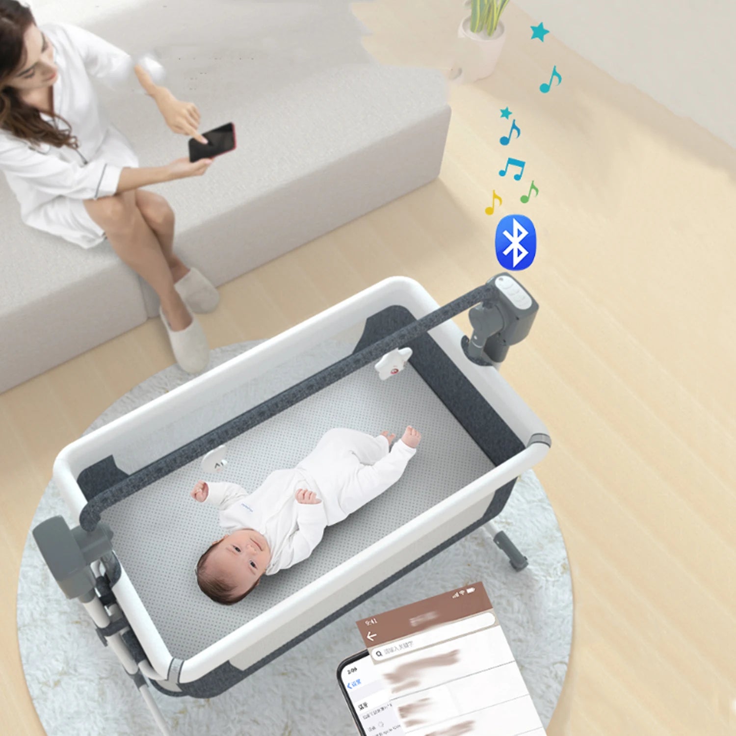 I YAN baby bassinet with automatic electric rocking, remote control, foldable travel design, suitable for newborns and co-sleeping.