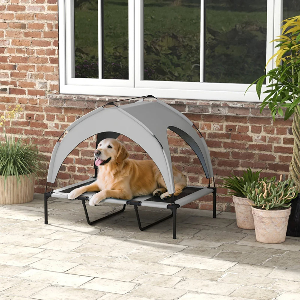 Raised outdoor dog bed with canopy by I YAN, featuring a large pet cot with elevated design for outdoor comfort.