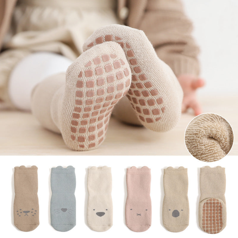 Pair of I YAN combed cotton socks for boys and girls, featuring colorful striped patterns and soft fabric for comfortable wear.