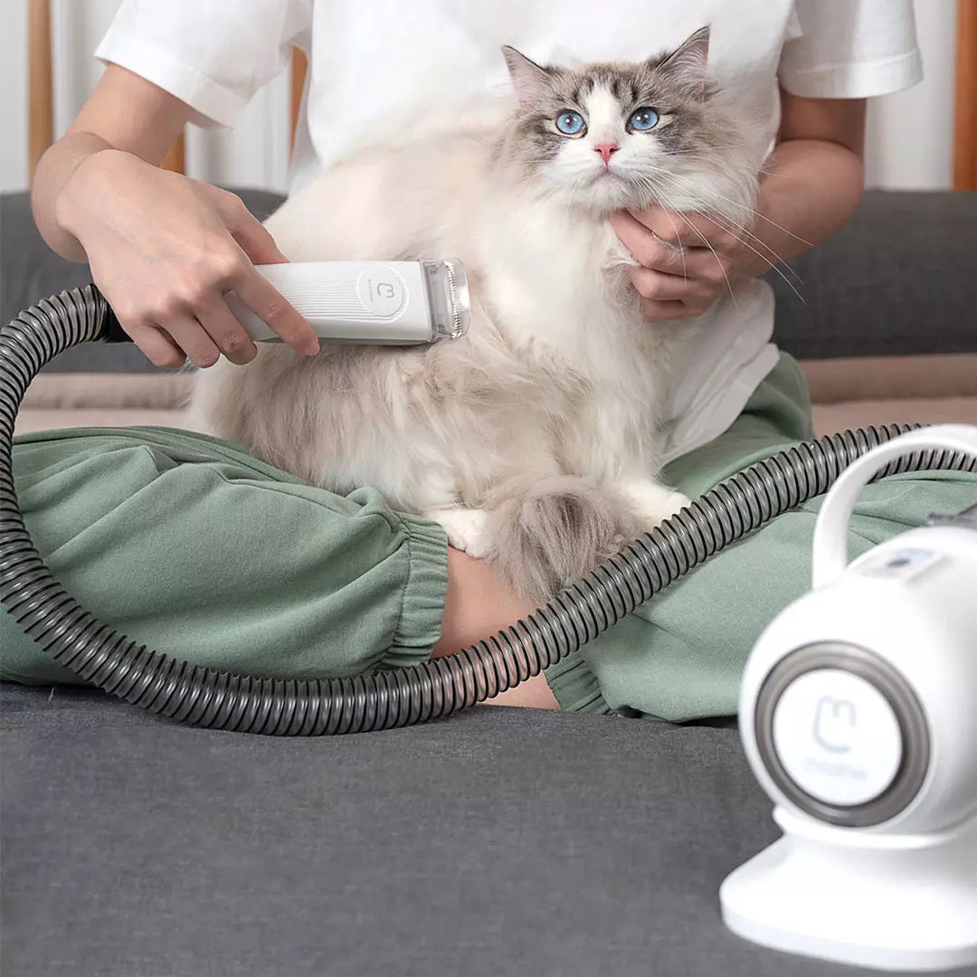 I YAN G2 Pet Grooming Kit with hair vacuum, showing smart clipper with attachment and built-in suction for pet grooming.