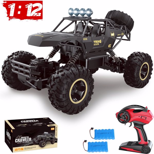 Yellow 4DRC Rock Track rechargeable off-road vehicle by I YAN with rugged tires on a rocky terrain.