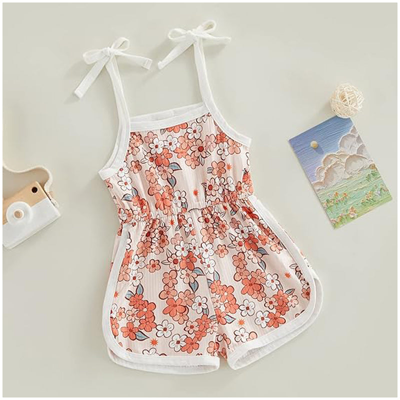 Toddler floral jumpsuit with tie-up suspenders and shorts, featuring a colorful floral pattern and adjustable straps.